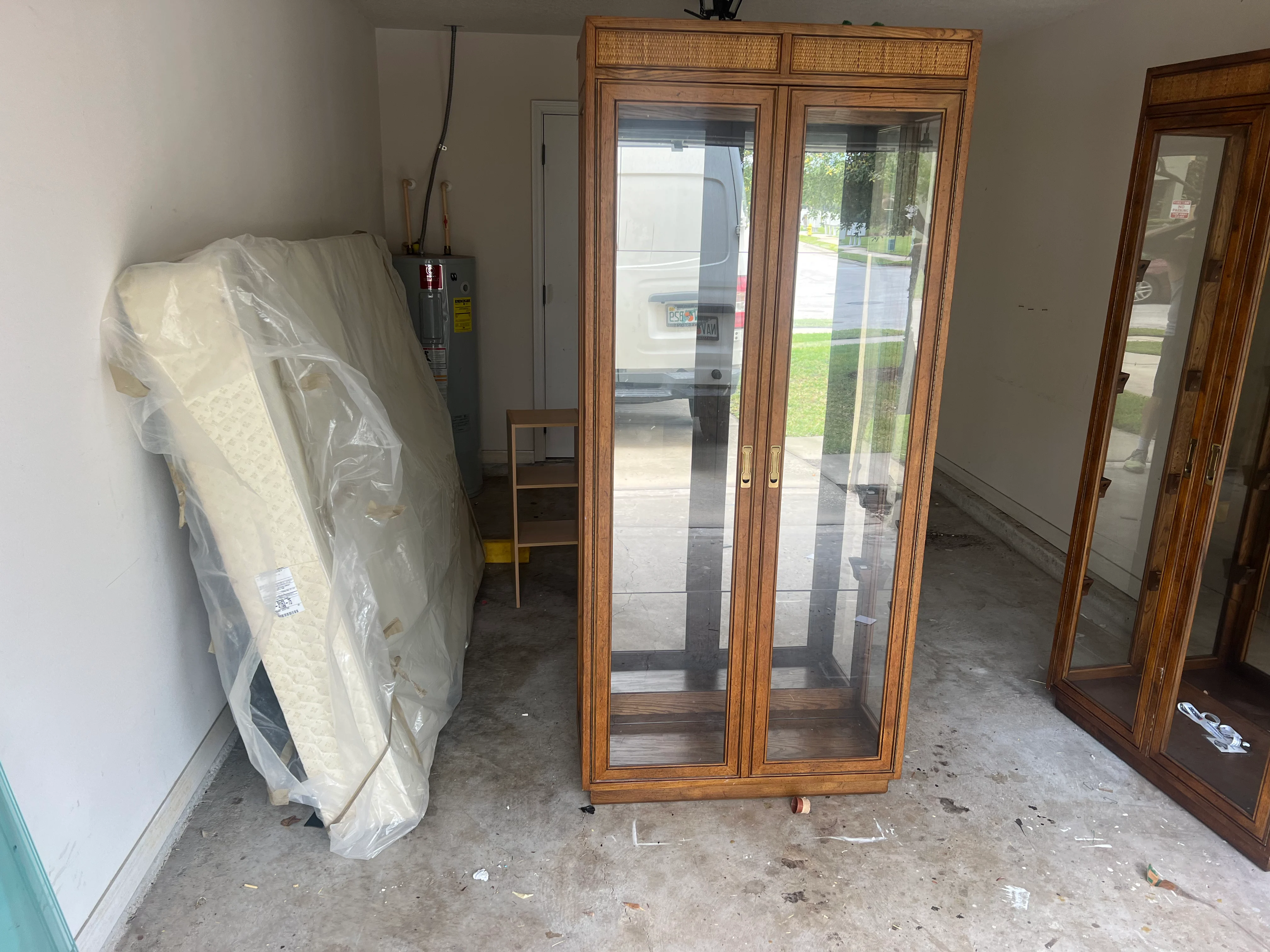Garage with household debris and items to be removed
